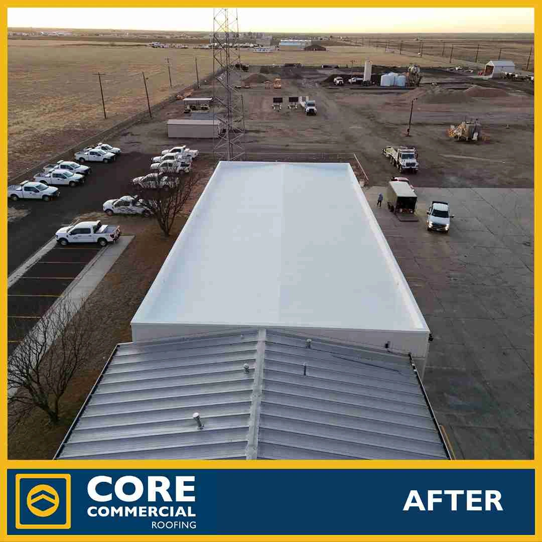 Aerial view of a flat commercial maintenance shop roof in the Dumas, Texas service area